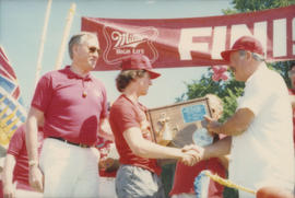 Award presentation at finish line