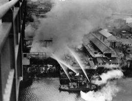 [Fireboat J.H. Carlisle fighting waterfront fire]