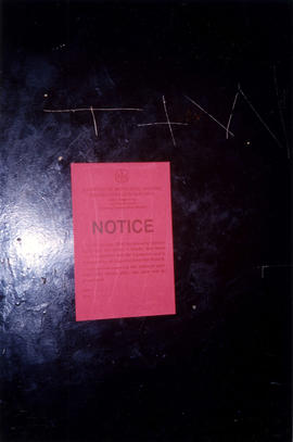 Notice on elevator doors of Columbia Hotel at 303 Columbia Street