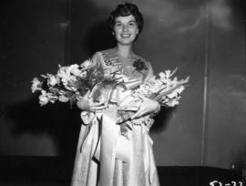 Winner of Miss Vancouver posing with flowers