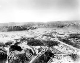 [Aerial view looking south of the] District of North Vancouver [between Seymour and Lynn Creeks]