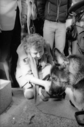 Theresa Galloway and police dog Sport at drinking fountain