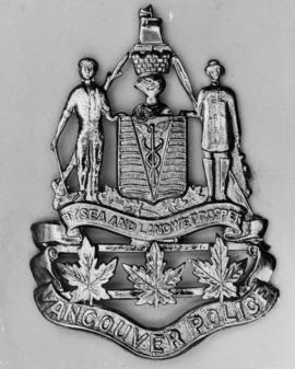 [View of casting of Vancouver City coat of arms with Police Department addition]