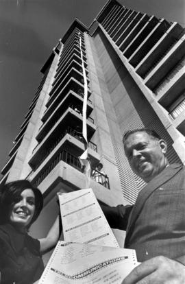 Girls from Britannia High School holding 300 feet of CP/CN telegram forms bearing signatures of V...