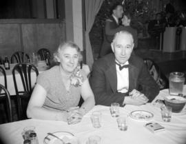 [Portrait of a man and woman at a Young Liberals party at the Commodore]