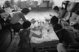 Jim Wong-Chu leading a silk-screening session for Pender Guy