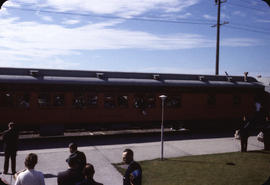 Pacific Great Eastern Seton Lake train car departing with people waving goodbyes and drummers