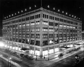 [Exterior of the Hudson Bay Co. Store at night - Granville and Georgia Streets]