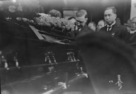 Funeral procession through Chinatown