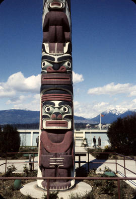 View of bottom of Totem pole at Hadden Park with Maritime Museum in background