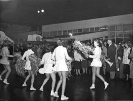 [Cheerleaders await the arrival of Canadian Olympic Teams from Australia at the airport]