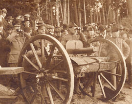 [Captain J.S. Matthews fires Maxim machine gun at practice at Second Beach]