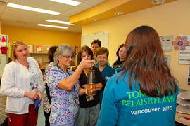 Day 52 Nurses stand in awe of the Olymic Flame at Children's Hospital in Hamilton, Ontario