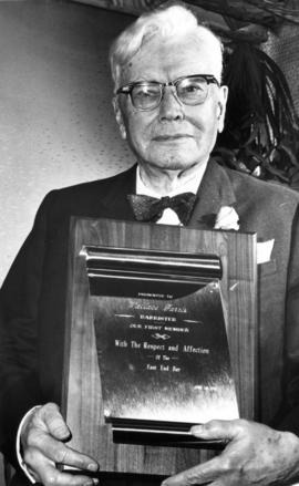 Senator J.W. de B. Farris receives a plaque at the Waldorf Hotel