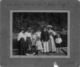 Out for a cruise on Mou Ping [family and friends standing on dock]