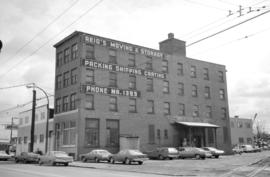 [View of building with sign for Reid's Moving & Storage]