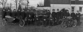 [Group portrait of South Vancouver Police Department with officers and two motorcycles]