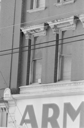 [Detail view of lower windows at 8-28 West Cordova Street - Army and Navy Department Store]